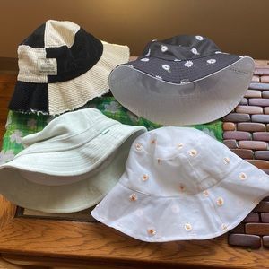 4 Bucket hats Tna green BDG b/w coAlice + Olivia black flowers and white flowers